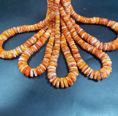 Natural spiny oyster shell beads . Gorgeous natural yellow orange color . Graduated . Excellent quality !