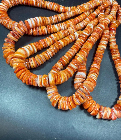 Natural spiny oyster shell beads . Gorgeous natural yellow orange color . Graduated . Excellent quality !