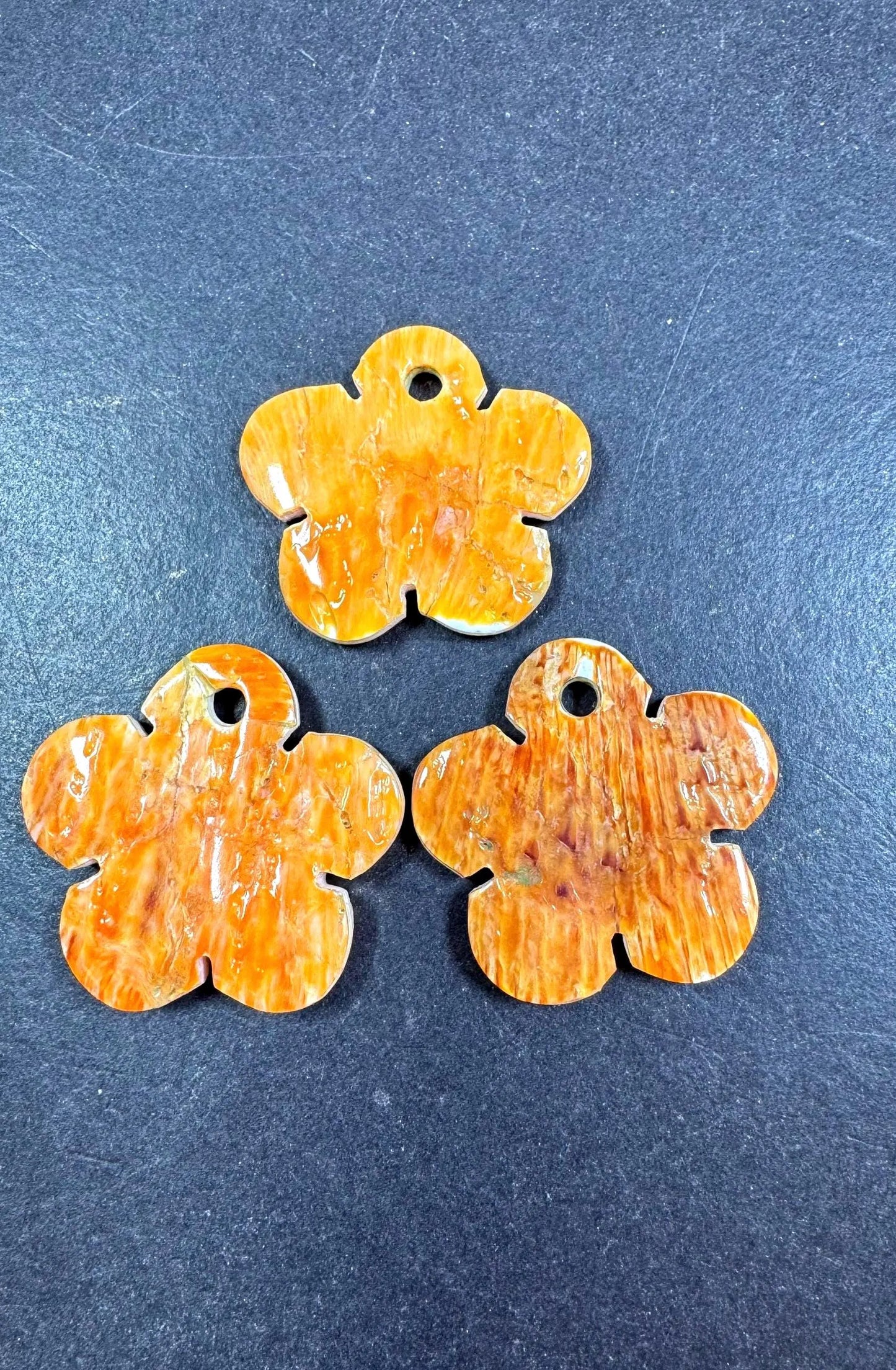 Natural spiny oyster shell pendant . Flower shape . Gorgeous Natural spiny oyster shell pendants . Natural orange yellow color . Not treated