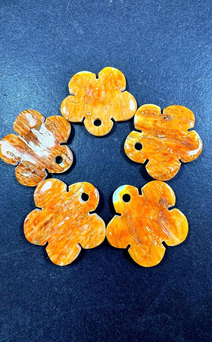 Natural spiny oyster shell pendant . Flower shape . Gorgeous Natural spiny oyster shell pendants . Natural orange yellow color . Not treated