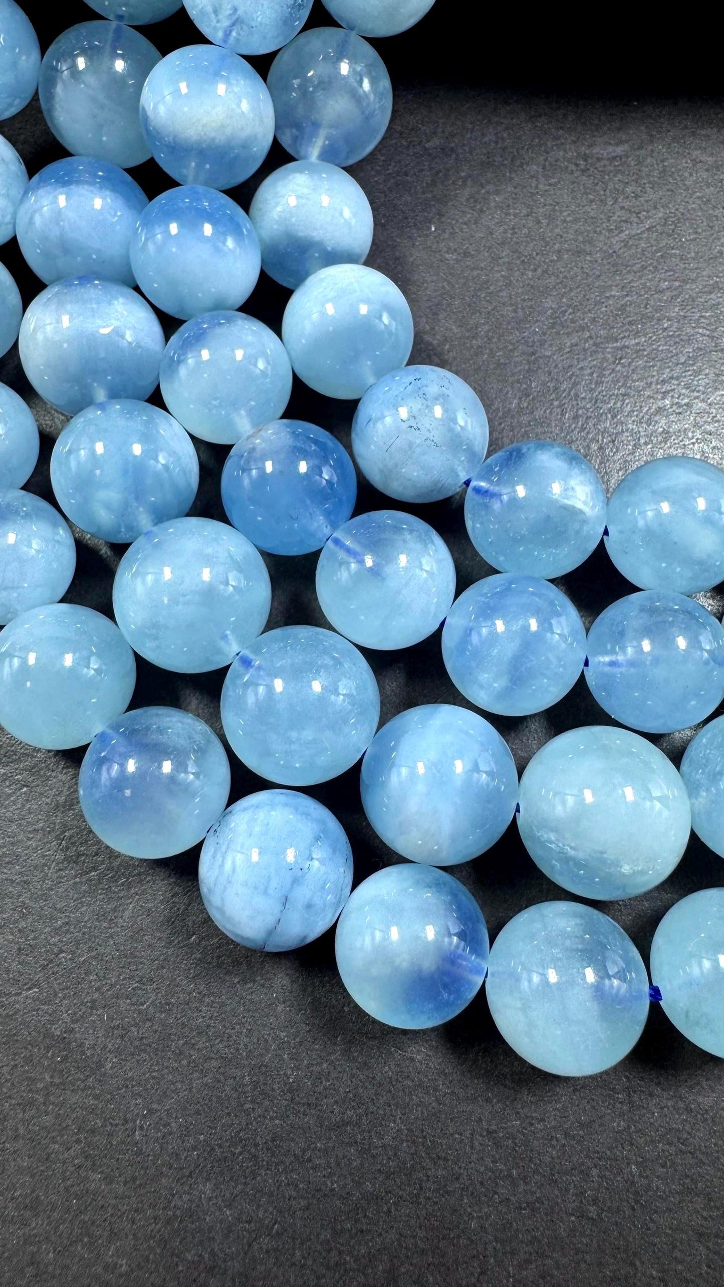 AA Natural Aquamarine gemstone beads. Smooth round shape . Excellent quality full strand 15.5”