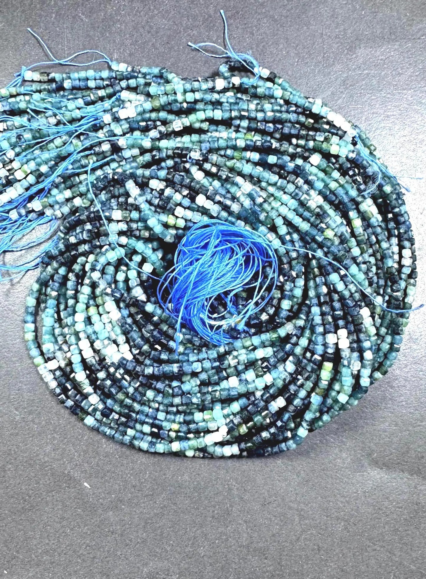 AAA Natural blue tourmaline gemstone beads. Faceted 3mm cube shape . Gorgeous Natural multi color tourmaline beads. Excellent quality .15.5”
