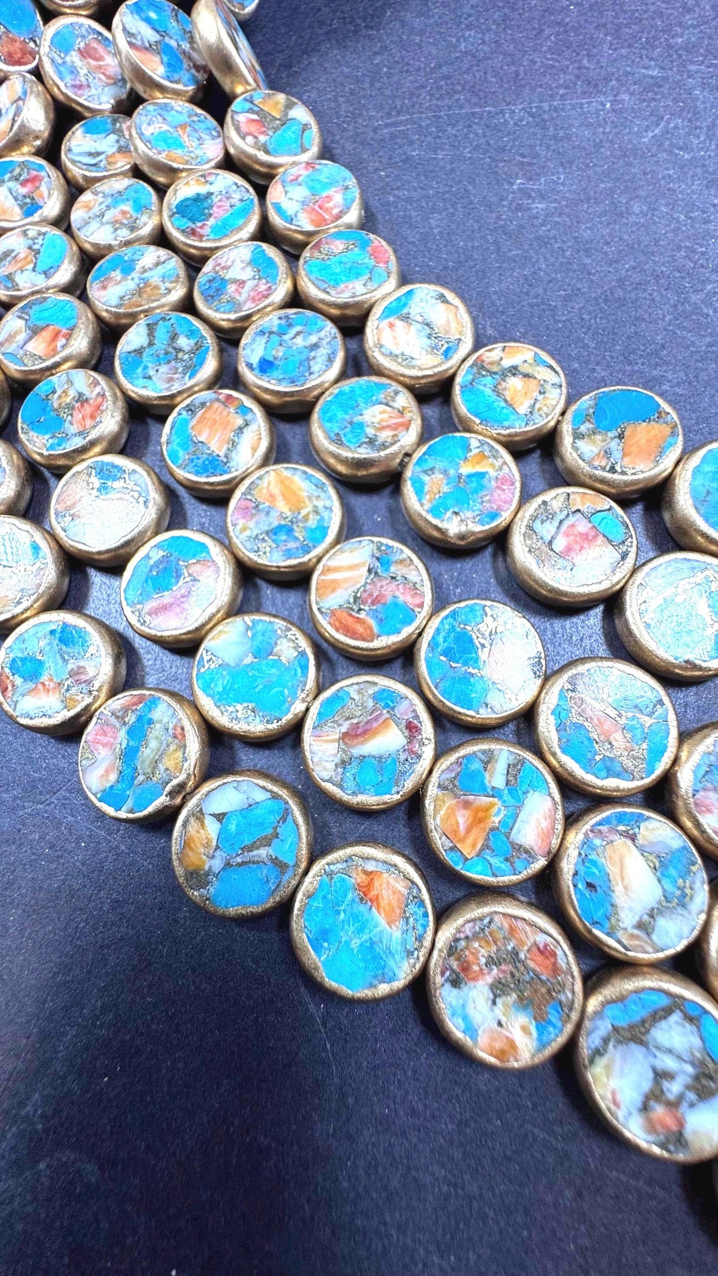 Natural turquoise gemstone bead. With gold copper . Coin shape . Excellent quality . Full strand 15.5”