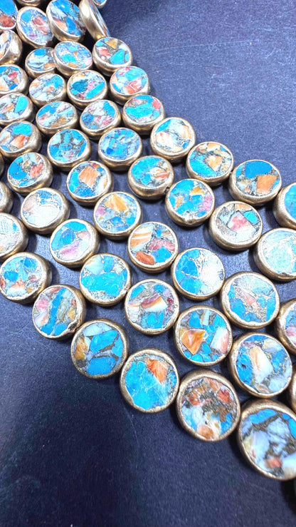 Natural turquoise gemstone bead. With gold copper . Coin shape . Excellent quality . Full strand 15.5”