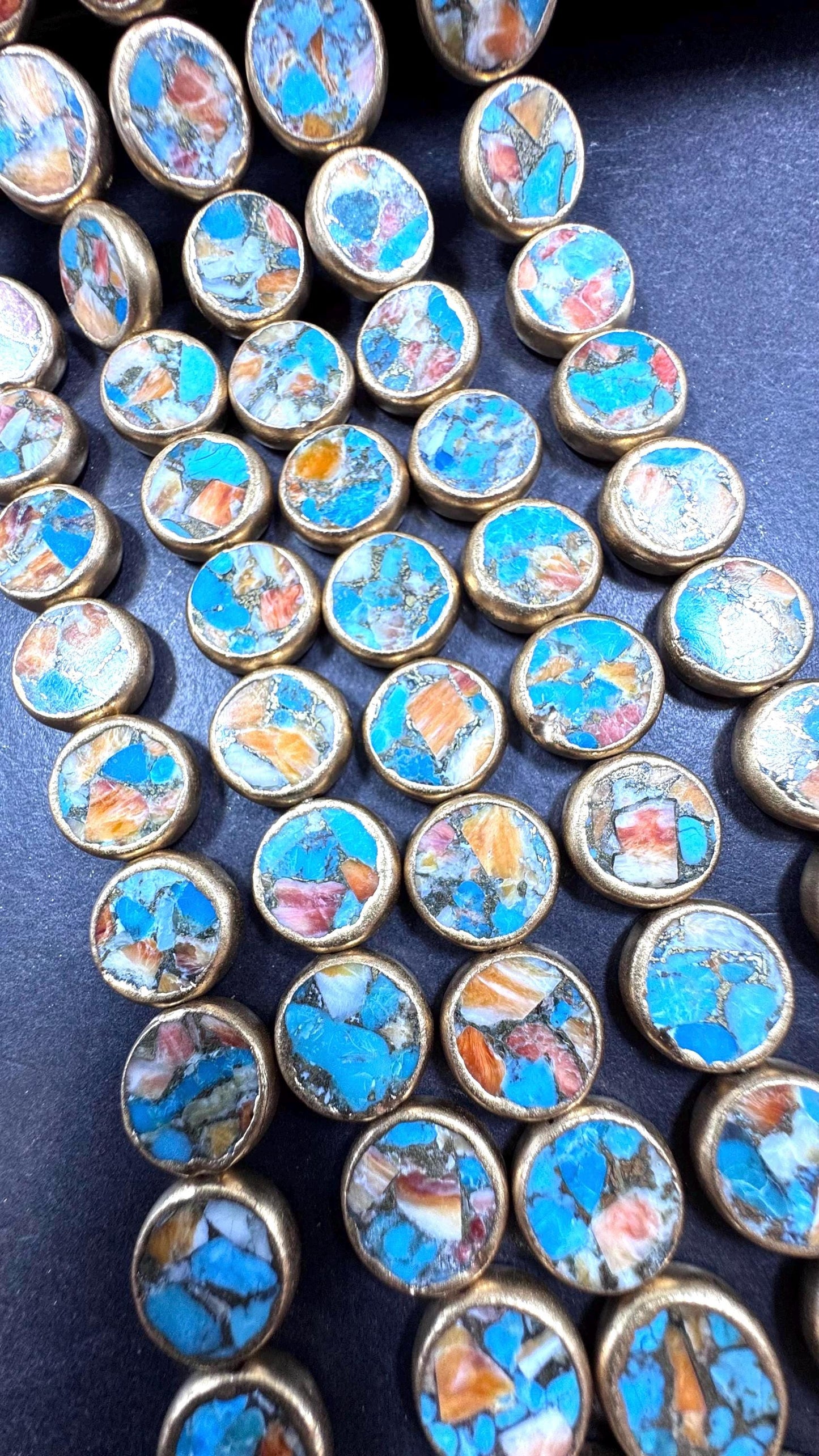 Natural turquoise gemstone bead. With gold copper . Coin shape . Excellent quality . Full strand 15.5”