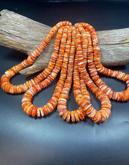 Natural spiny oyster shell beads . Gorgeous natural yellow orange color . Graduated . Excellent quality !