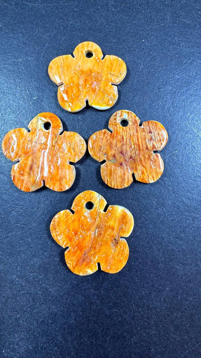 Natural spiny oyster shell pendant . Flower shape . Gorgeous Natural spiny oyster shell pendants . Natural orange yellow color . Not treated