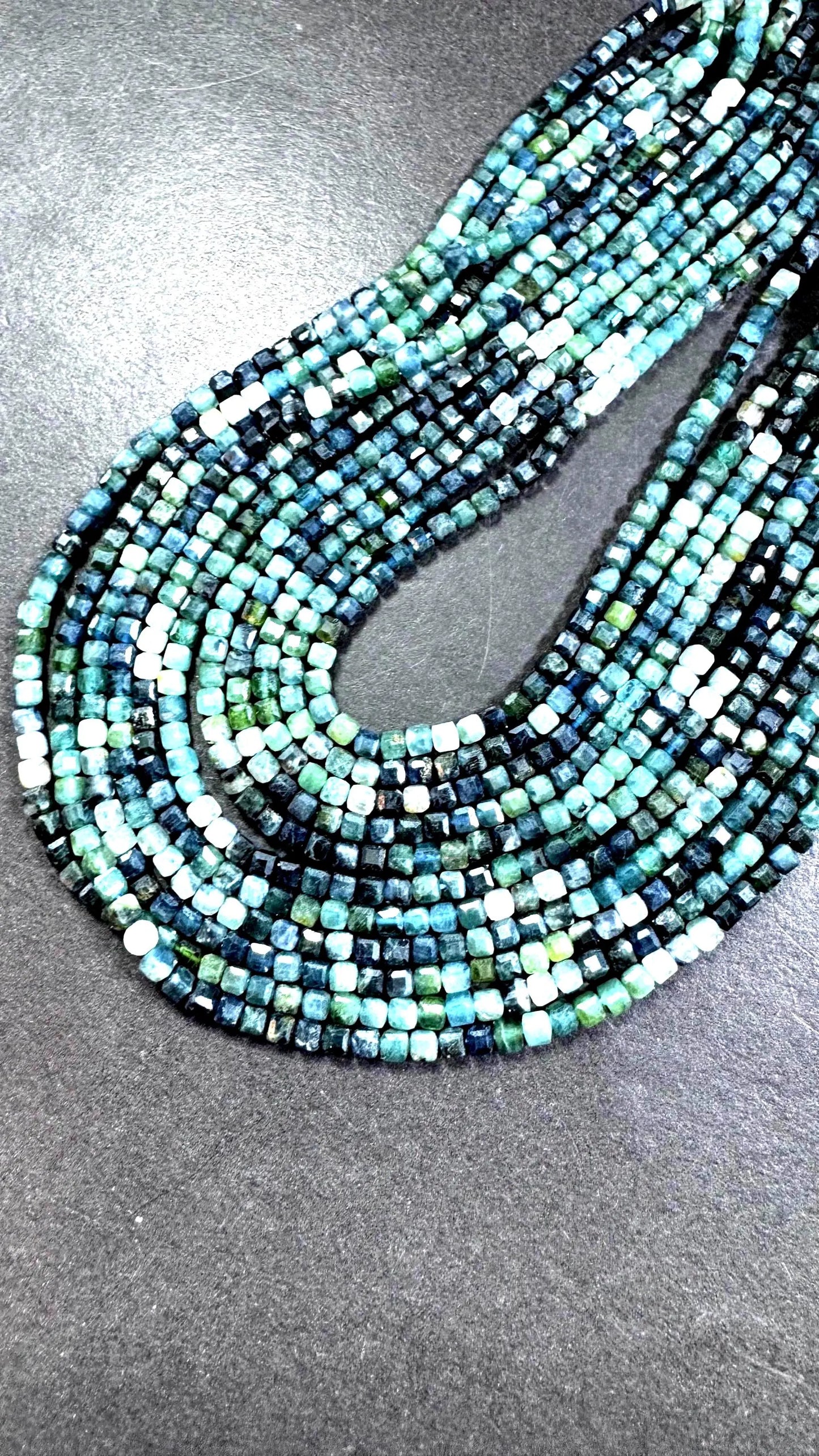 AAA Natural blue tourmaline gemstone beads. Faceted 3mm cube shape . Gorgeous Natural multi color tourmaline beads. Excellent quality .15.5”
