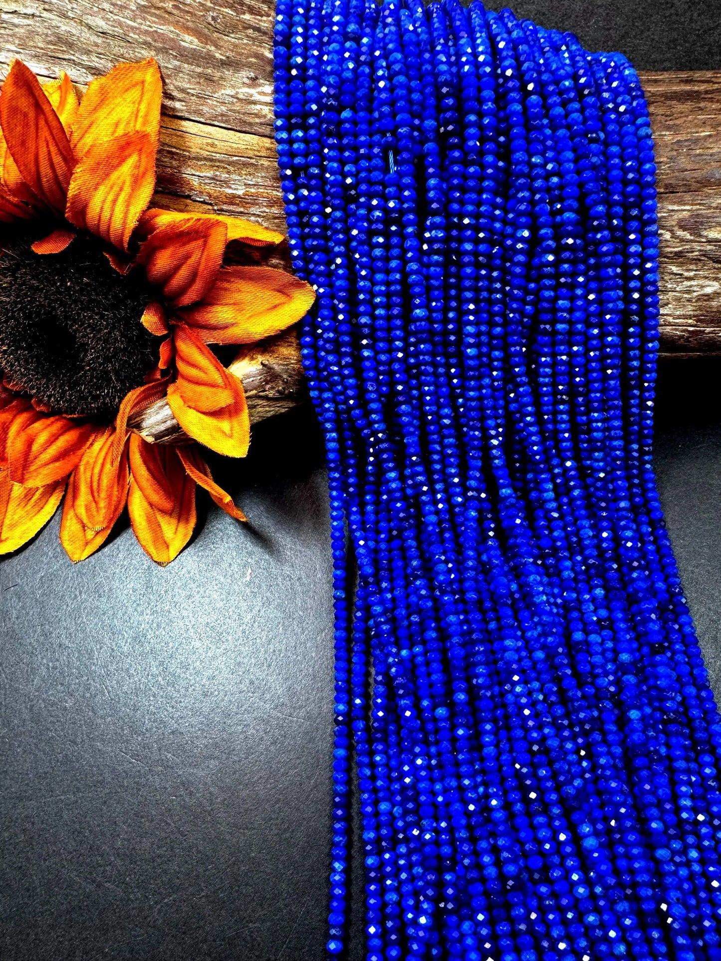 100% AAA Natural lapis lazuli 2x4mm gemstone. Faceted rondelle bead. Natural blue color. not treated . excellent quality .full strand 15.5