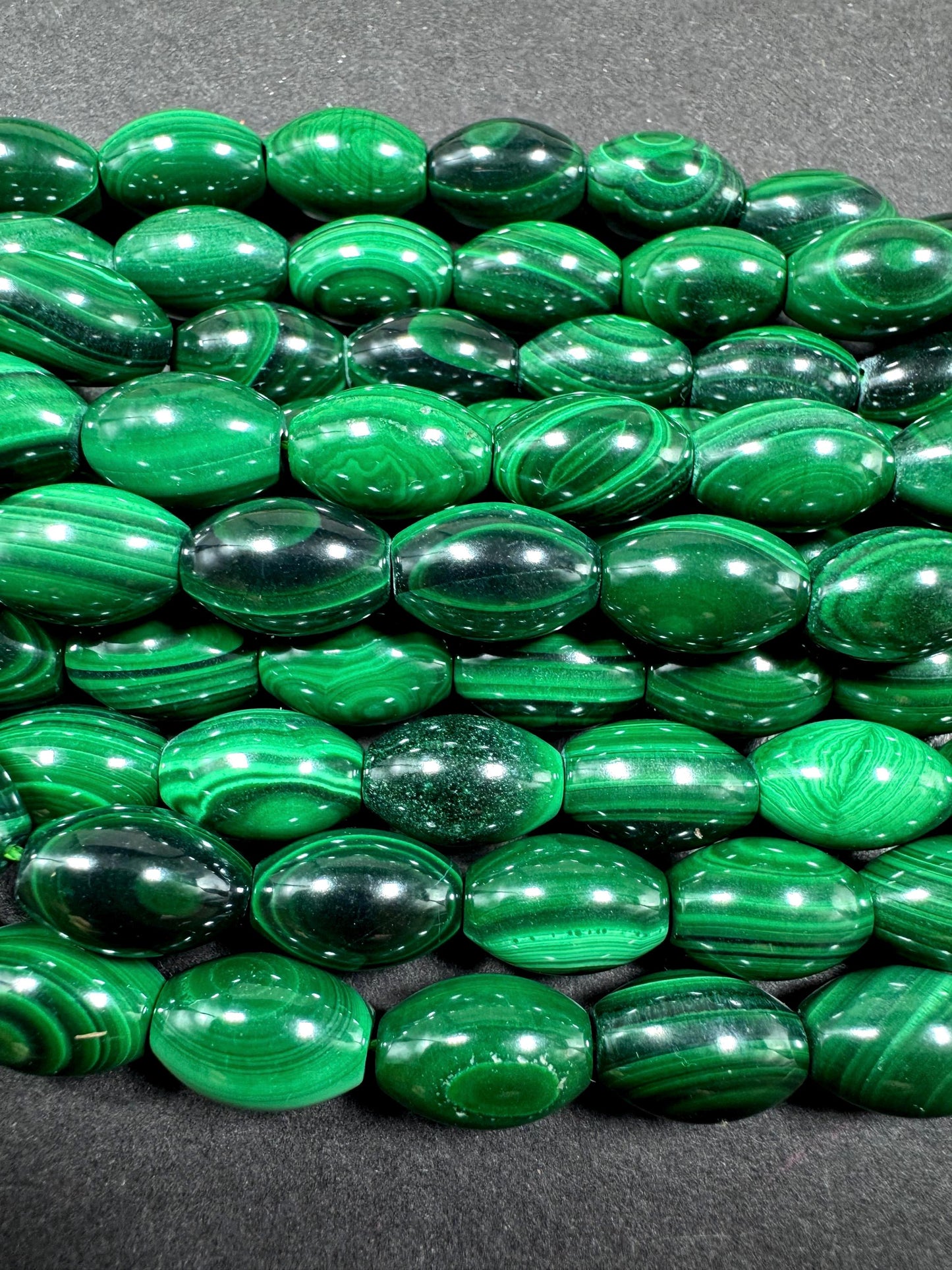 AAA Natural Malachite gemstone bead. Barrel shape. Beautiful Natural Green color. Great quality. Full strand 15.5"