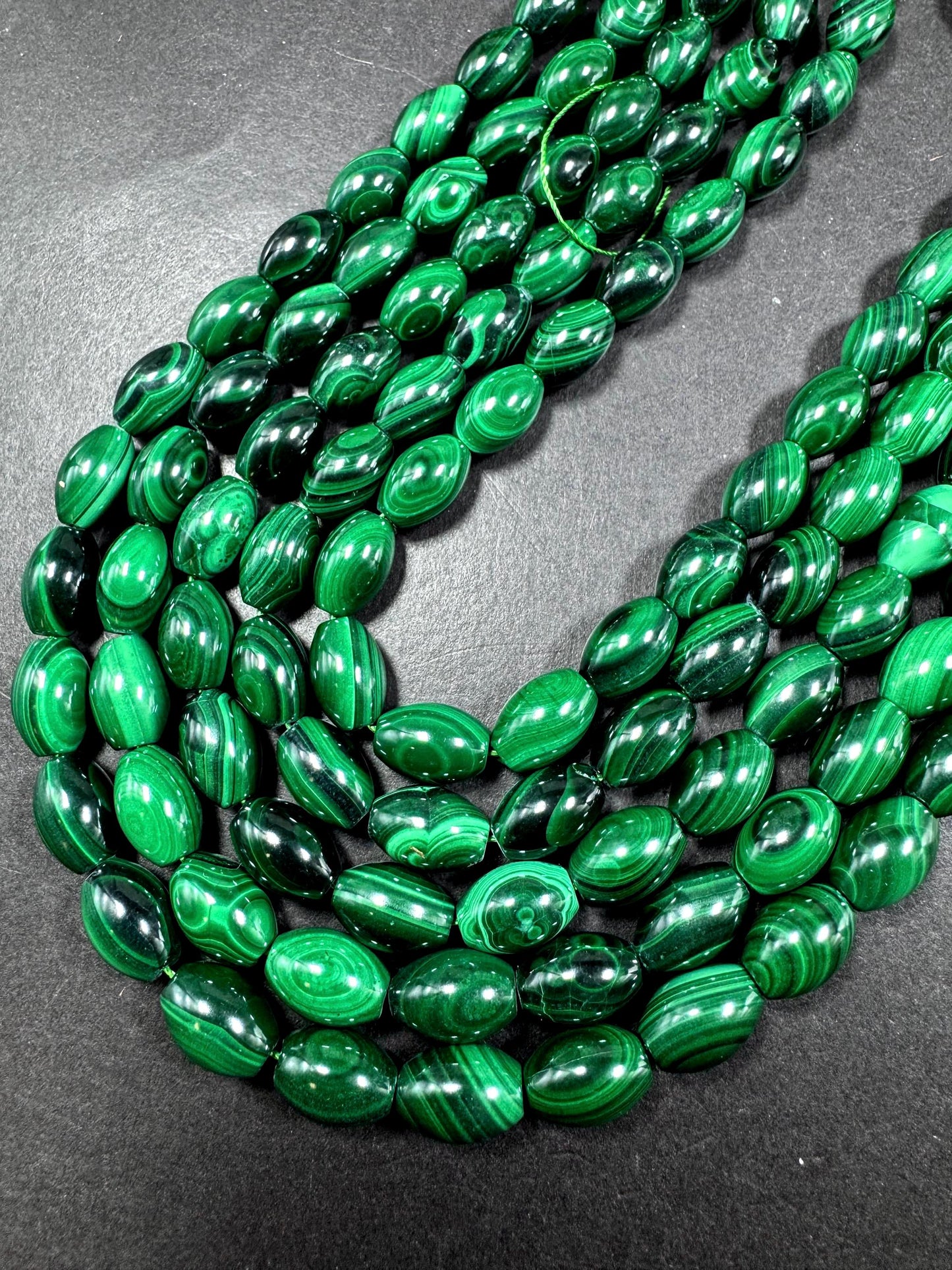 AAA Natural Malachite gemstone bead. Barrel shape. Beautiful Natural Green color. Great quality. Full strand 15.5"