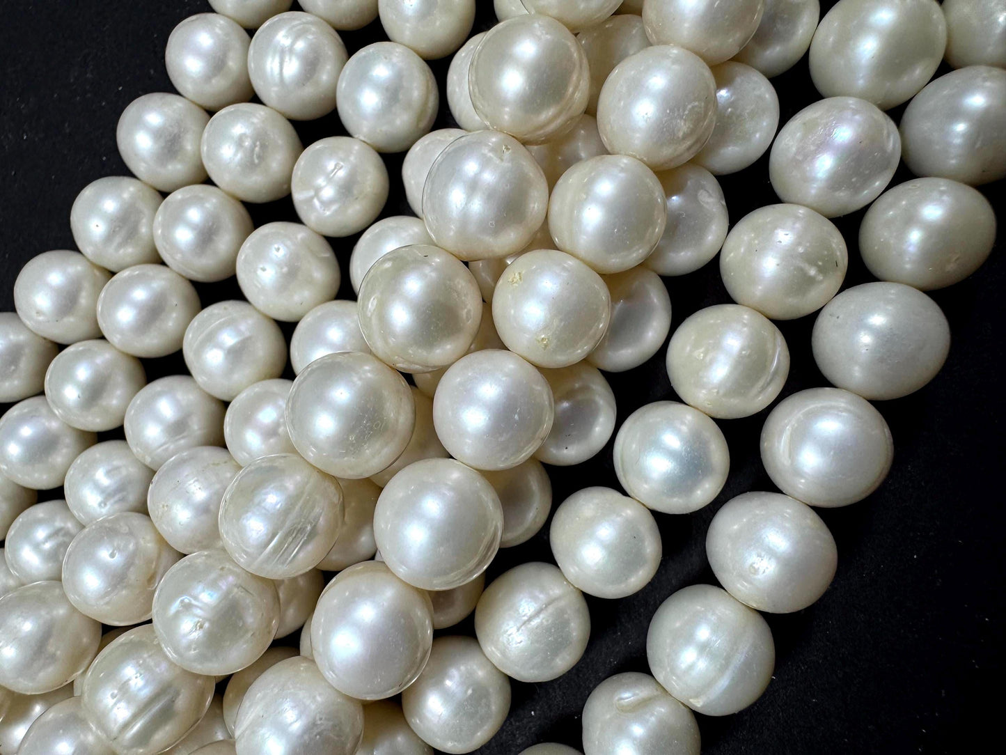 100% Natural fresh water pearls beads. natural white color round beads . excellent quality . full strand.