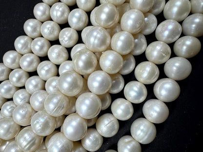 100% Natural fresh water pearls beads. natural white color round beads . excellent quality . full strand.