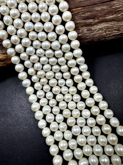 100% Natural fresh water pearls beads. natural white color round beads . excellent quality . full strand.