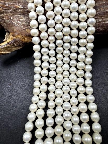 100% Natural fresh water pearls beads. natural white color round beads . excellent quality . full strand.
