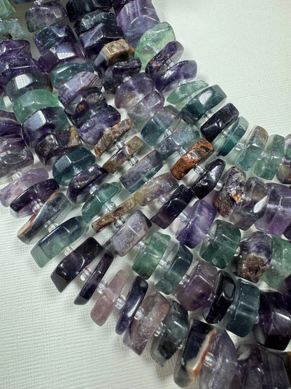 Natural fluorite gemstone beads. pinwheel shape . gorgeous natural color. not treated . excellent quality. full strand 15.5”