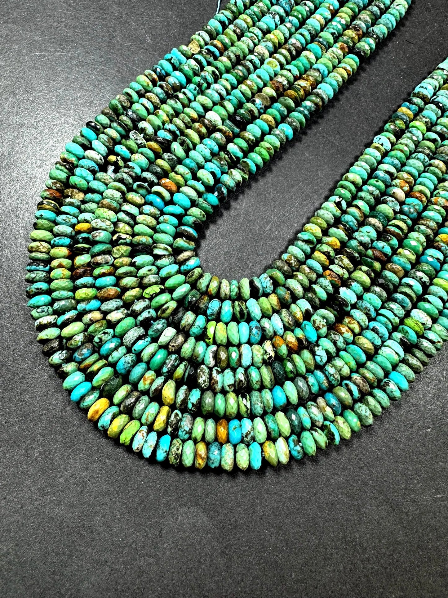 100% Natural turquoise gemstone bead. faceted Roundell shape . natural blue brown color. Excellent quality ! full strand 15.5