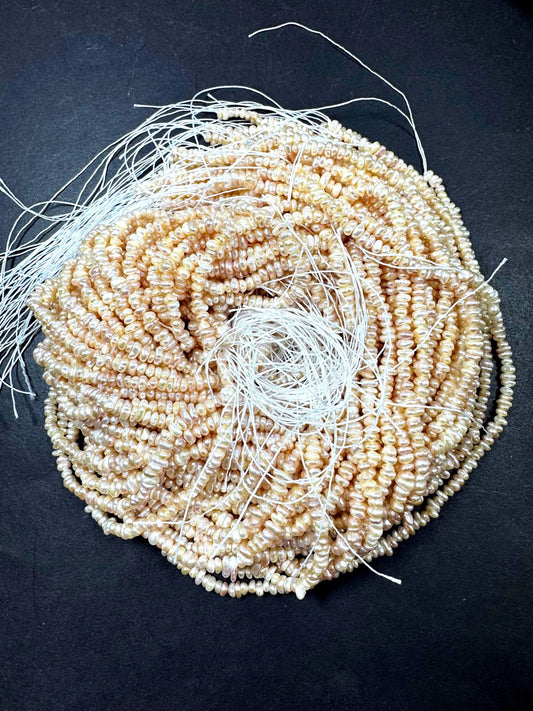 Natural fresh water pearls beads. Natural cream pink color . Excellent quality . Full strand.