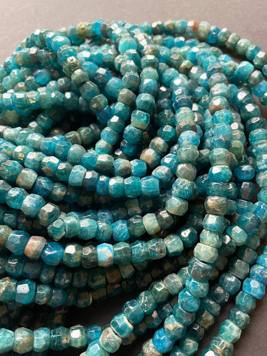 AAA Natural apatite. Faceted Roundell gemstone bead. 5x8mm . Gorgeous sea blue color bead . High quality gemstone bead. 15.5” strand