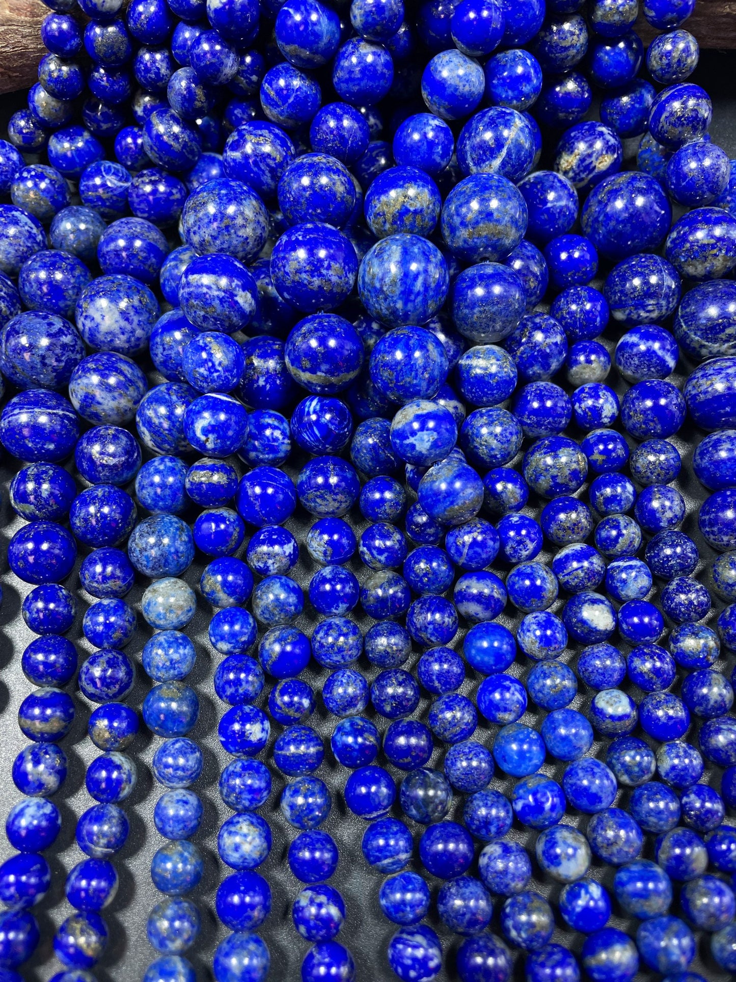 AAA natural lapis lazuli stone bead. Graduated shape. Gorgeous natural royal blue color. Lapis lazuli bead. 8mm round bead. Loose stone bead