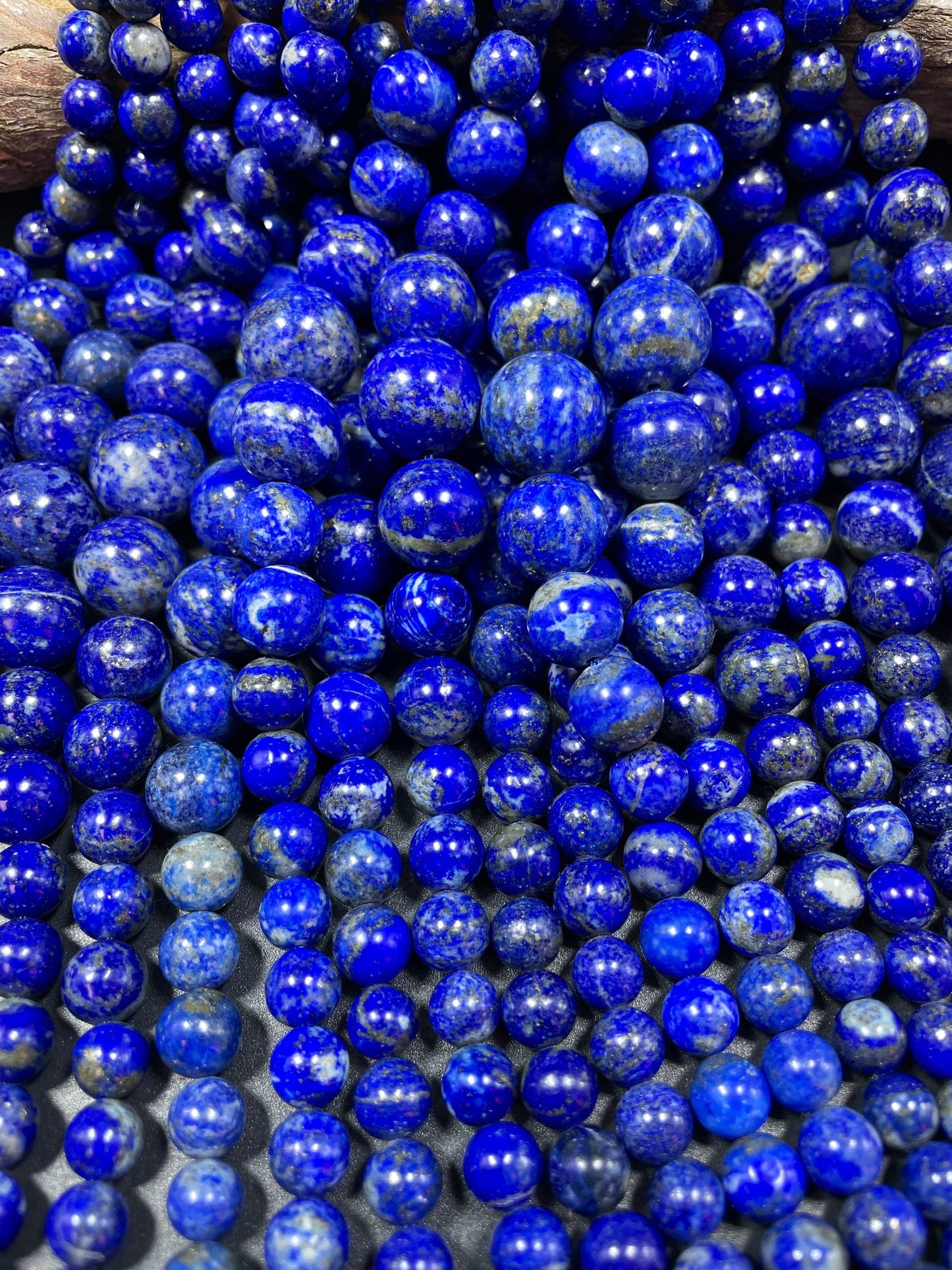 AAA natural lapis lazuli stone bead. Graduated shape. Gorgeous natural royal blue color. Lapis lazuli bead. 8mm round bead. Loose stone bead